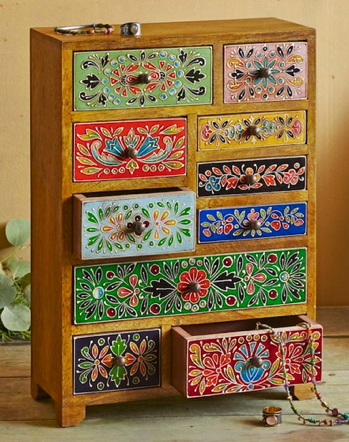 Jan 14 - There's just something wonderful about this little chest of drawers. The colors, the patterns, the randomness of the drawers... cute!